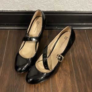 Woman’s black heels